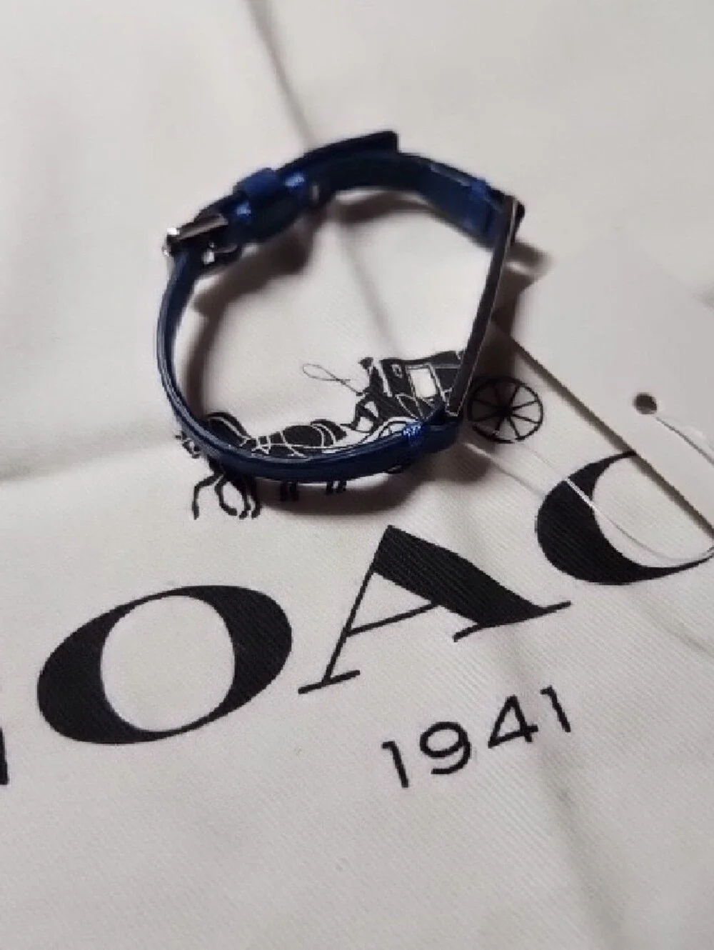 Coach Blue Leather Wristband with Metal Tracker Plate